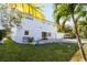 Front view of house with palm trees at 1790 Ezelle Ave, Largo, FL 33770