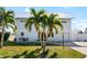 Two-story house with metal roof and landscaping at 1790 Ezelle Ave, Largo, FL 33770