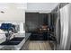 Modern kitchen with stainless steel appliances and granite countertops at 1790 Ezelle Ave, Largo, FL 33770