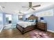 Spacious main bedroom with wood furniture and access to bathroom at 1790 Ezelle Ave, Largo, FL 33770
