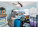 Storage room with various boxes, luggage, and clothing at 1790 Ezelle Ave, Largo, FL 33770