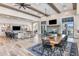 Spacious clubhouse with comfortable seating and large screen TV at 17920 Palmiste Dr, Bradenton, FL 34202