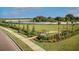 Community dog park with fenced area and benches at 17920 Palmiste Dr, Bradenton, FL 34202