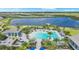 Community pool with lounge chairs and waterfront views at 17920 Palmiste Dr, Bradenton, FL 34202