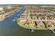 Aerial view of Sanctuary Cove, showcasing waterfront homes and marina at 1810 5Th E St, Palmetto, FL 34221