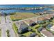 Aerial view of waterfront community with large empty lot at 1810 5Th E St, Palmetto, FL 34221