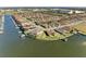 Aerial view of Sanctuary Cove, highlighting waterfront homes and marina at 1810 5Th E St, Palmetto, FL 34221