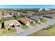 Community overview featuring several homes with tile roofs and lush landscaping at 1810 5Th E St, Palmetto, FL 34221