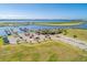 Aerial view of waterfront community with marina, clubhouse, and pool at 1810 5Th E St, Palmetto, FL 34221
