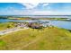 Aerial view showing community clubhouse, pool, and marina access at 1810 5Th E St, Palmetto, FL 34221