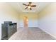 Spacious bedroom with access to hallway and bathroom at 1810 5Th E St, Palmetto, FL 34221