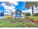 Sanctuary Cove community entrance sign with landscaping at 1810 5Th E St, Palmetto, FL 34221