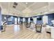 Open and inviting community room with seating and TV at 1810 5Th E St, Palmetto, FL 34221