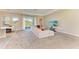 Open concept living area with comfortable seating and large TV at 1810 5Th E St, Palmetto, FL 34221