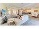 Open living area with sectional sofa and kitchen views at 1810 5Th E St, Palmetto, FL 34221