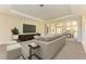 Spacious living room with large TV and open floor plan at 1810 5Th E St, Palmetto, FL 34221