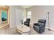 Relaxing sitting area with two recliners and a decorative coffee table at 1810 5Th E St, Palmetto, FL 34221
