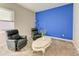 Cozy sitting area with two recliners and a stylish coffee table at 1810 5Th E St, Palmetto, FL 34221