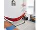 Bedroom with a hammock and large window at 2111 Tally Breeze Way, Bradenton, FL 34208