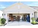 Garage with shelving, tools, and refrigerator at 2111 Tally Breeze Way, Bradenton, FL 34208