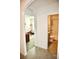 Hallway view of bedroom and bathroom at 2111 Tally Breeze Way, Bradenton, FL 34208