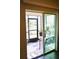 Bright, airy screened patio accessible through sliding glass doors at 2111 Tally Breeze Way, Bradenton, FL 34208