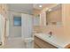 Bathroom with tub, toilet, and vanity at 2708 Bigelow Dr, Sarasota, FL 34239