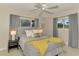 Bedroom with a full-size bed and plenty of natural light at 2708 Bigelow Dr, Sarasota, FL 34239