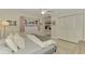Bedroom with queen-size bed, built-in shelves, and ample closet space at 2708 Bigelow Dr, Sarasota, FL 34239