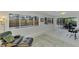 Bright Gathering room with pool view, comfortable seating, and large windows at 2708 Bigelow Dr, Sarasota, FL 34239