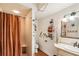 Bathroom with shower stall, toilet, vanity, and decorative accents at 3011 Ashton Rd, Sarasota, FL 34231