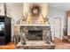 Stone fireplace with decorative mantel and Gathering photo at 3011 Ashton Rd, Sarasota, FL 34231