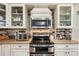 Kitchen features stainless steel appliances and white cabinets at 3011 Ashton Rd, Sarasota, FL 34231