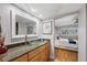 Modern bathroom with glass vessel sink and view of bedroom at 3300 S Beneva Rd # 224, Sarasota, FL 34232
