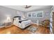 Bright bedroom with wood floors and plenty of natural light at 3300 S Beneva Rd # 224, Sarasota, FL 34232