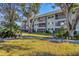 Building exterior showcasing landscaping and a walkway at 3300 S Beneva Rd # 224, Sarasota, FL 34232