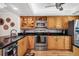 Kitchen with stainless steel appliances and wood cabinets at 3300 S Beneva Rd # 224, Sarasota, FL 34232