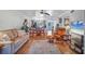 Living room, hardwood floors, and view of kitchen at 3300 S Beneva Rd # 224, Sarasota, FL 34232