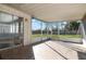 Spacious screened porch overlooking backyard at 3652 Sharondale Dr, Sarasota, FL 34232