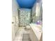 Bathroom with shower/tub combo, vanity, and beachy decor at 3750 59Th W Ave # 4096, Bradenton, FL 34210