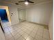 Spacious bedroom with mirrored closet doors and tile floors at 3750 59Th W Ave # 4096, Bradenton, FL 34210