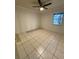 Bright bedroom with tile flooring and ceiling fan at 3750 59Th W Ave # 4096, Bradenton, FL 34210