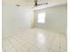 Bright bedroom with tile flooring and ceiling fan at 3750 59Th W Ave # 4096, Bradenton, FL 34210