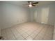Bright bedroom with tile flooring and mirrored closet doors at 3750 59Th W Ave # 4096, Bradenton, FL 34210