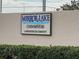 Mirror Lake Condominiums sign at entrance at 3750 59Th W Ave # 4096, Bradenton, FL 34210