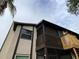 Building exterior showcasing a balcony and screened porch at 3750 59Th W Ave # 4096, Bradenton, FL 34210