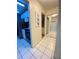 Hallway with view into kitchen and bathroom at 3750 59Th W Ave # 4096, Bradenton, FL 34210