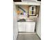 Laundry room with washer, dryer, and ample storage at 3750 59Th W Ave # 4096, Bradenton, FL 34210