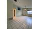 Spacious living room with tile floors and a ceiling fan at 3750 59Th W Ave # 4096, Bradenton, FL 34210