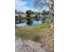 Tranquil pond view with surrounding landscape and buildings at 3750 59Th W Ave # 4096, Bradenton, FL 34210